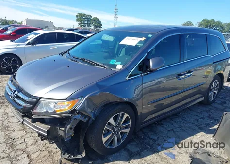 2016 Honda Odyssey Touring/Touring Elite z USA, uszkodzony, nr VIN 5FNRL5H98GB098883